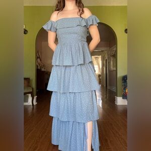 Floor length blue ruffle dress